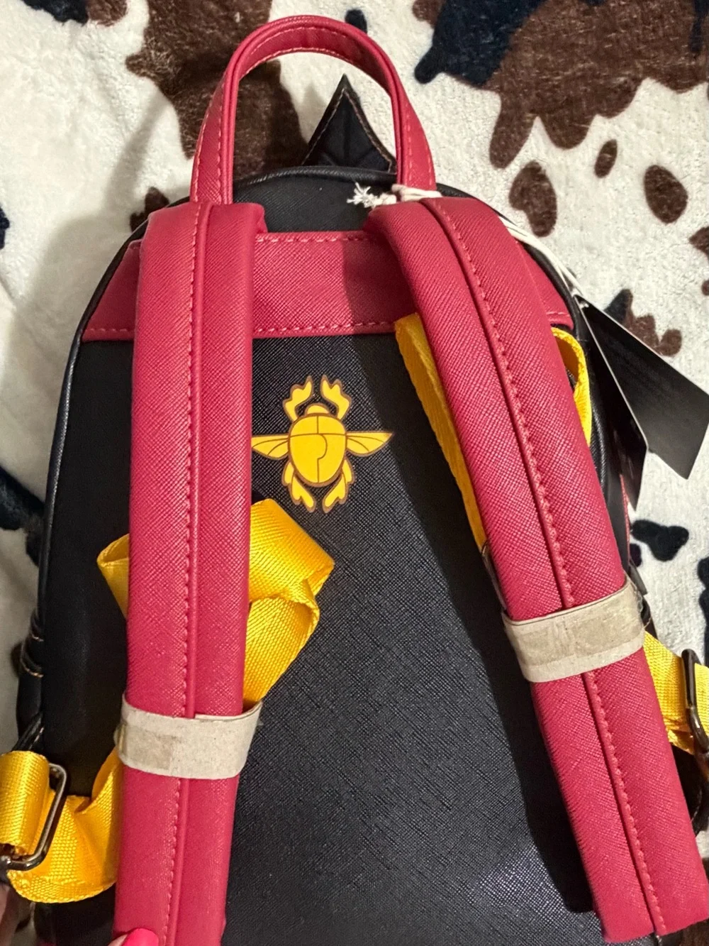 Loungefly Black Mini Backpack with Pink Trim and Yellow Stitching